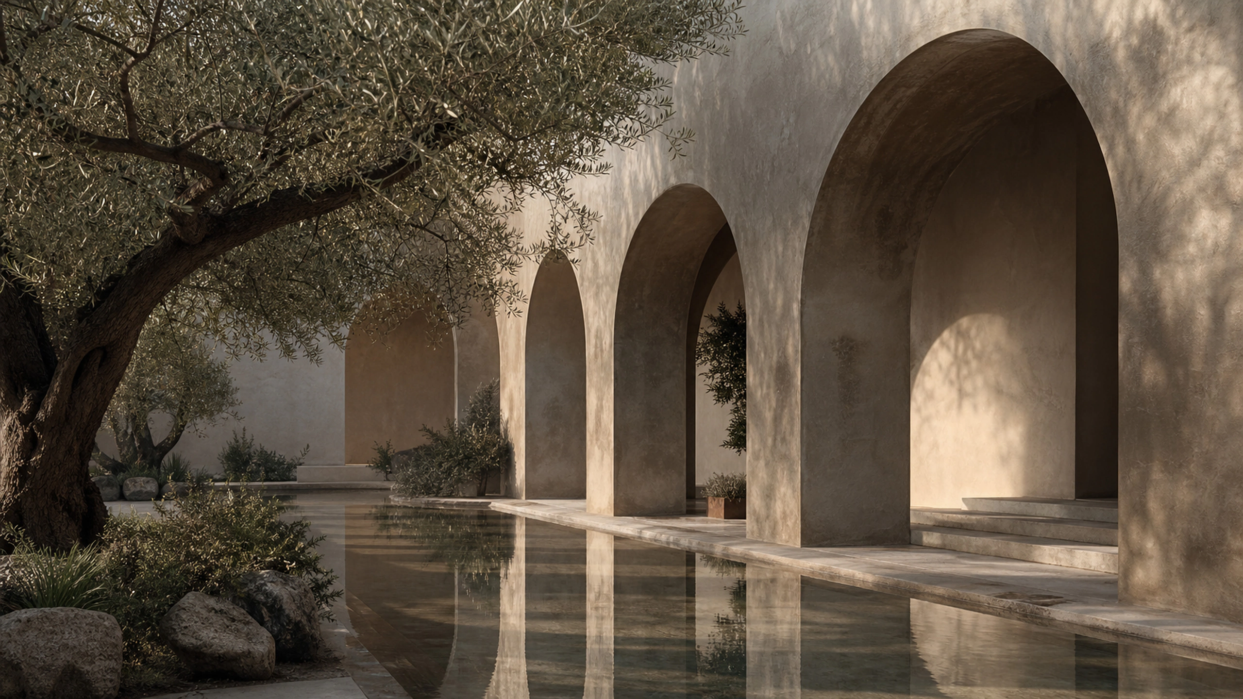 Earth-toned plaster courtyard with deep asymmetrical arches and silver-green olive leaves, original 4K architecture wallpaper