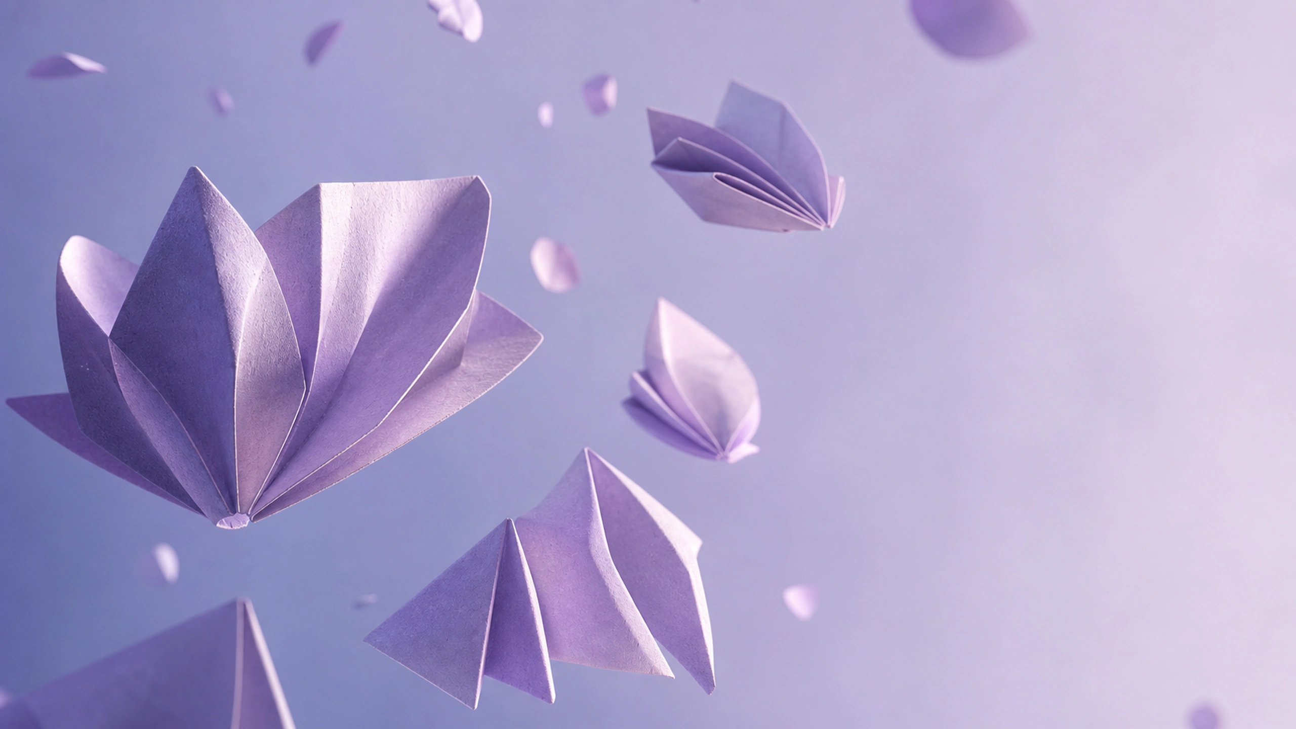 Independent folded-paper forms suspended at varied depths in soft lilac studio light, original 4K abstract wallpaper
