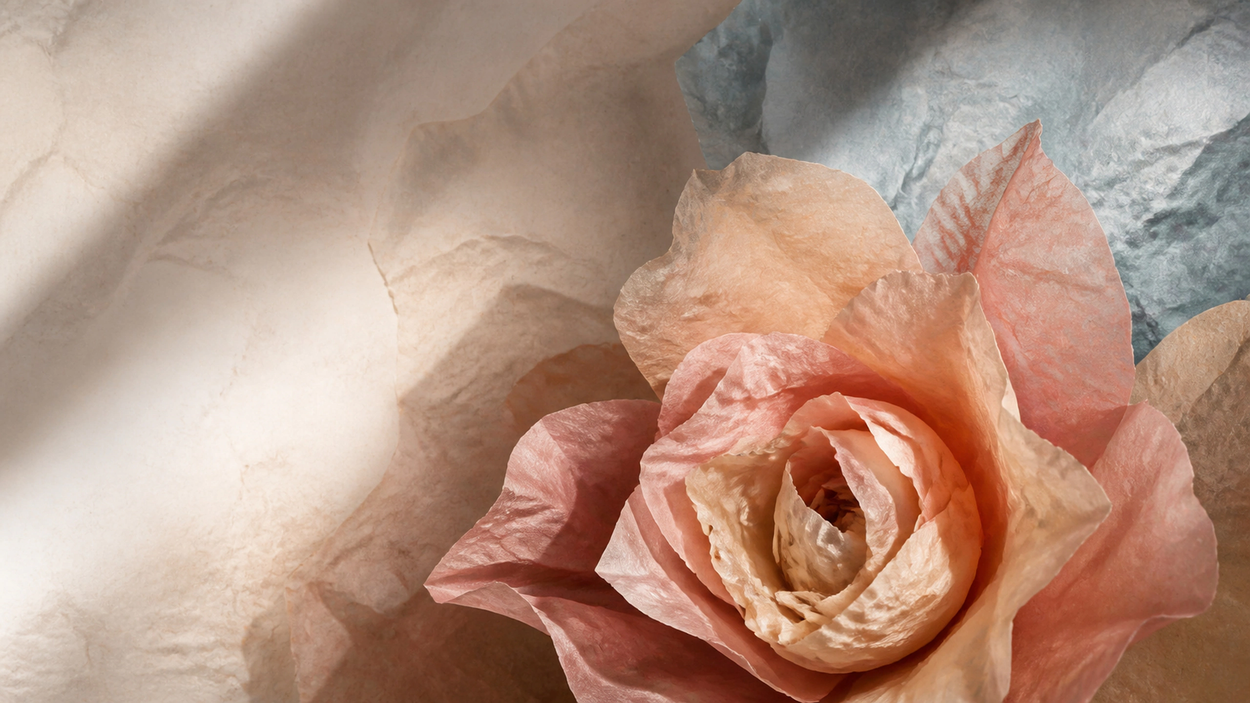 Expressive flower assembled from crumpled handmade paper, natural wrinkles and soft shadow, original 4K abstract wallpaper