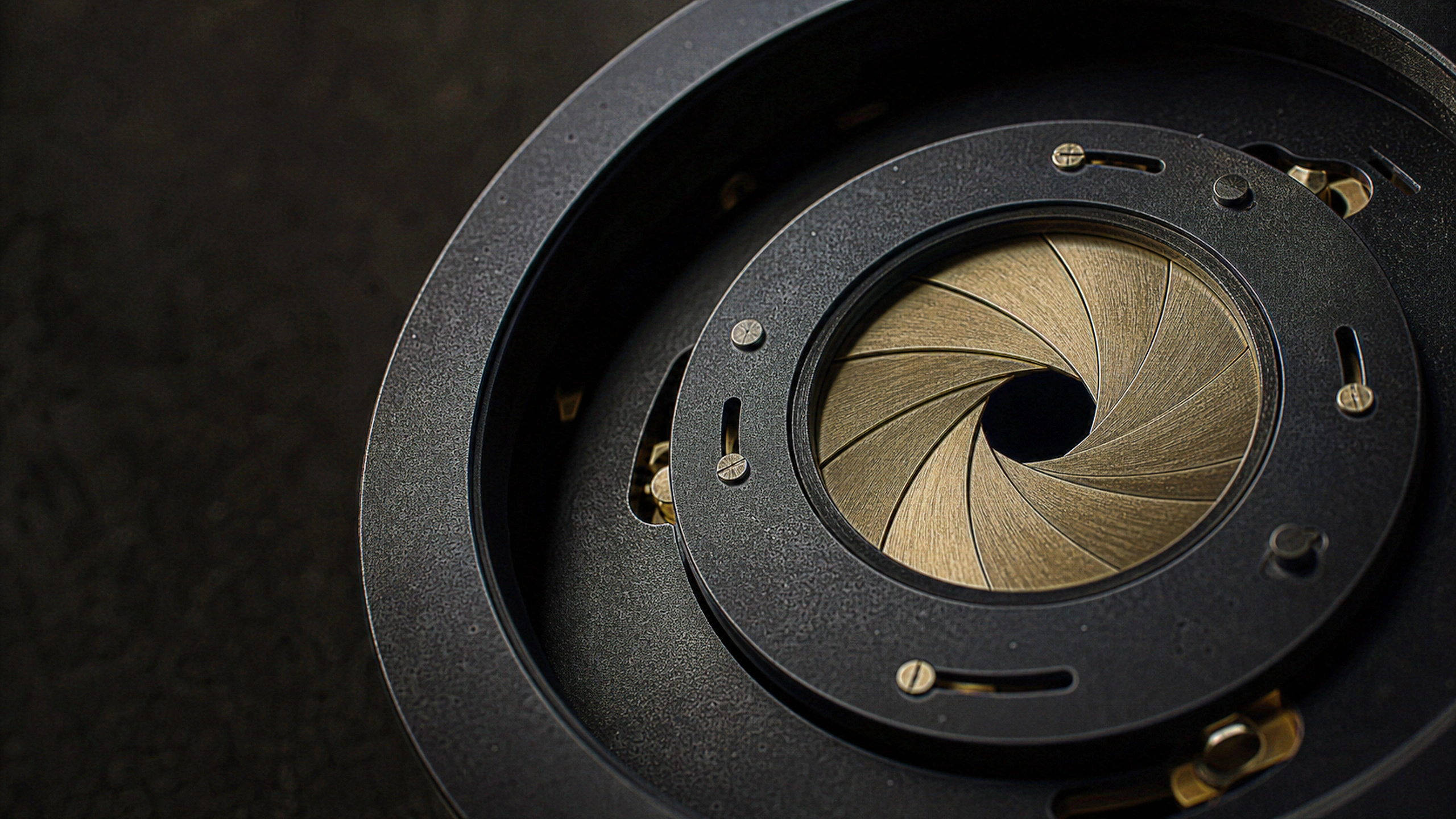 Original black ceramic mechanical iris with slim brass blades, precise concentric engineering, tiny fasteners and clean edge lighting, original 4K dark amoled wallpaper