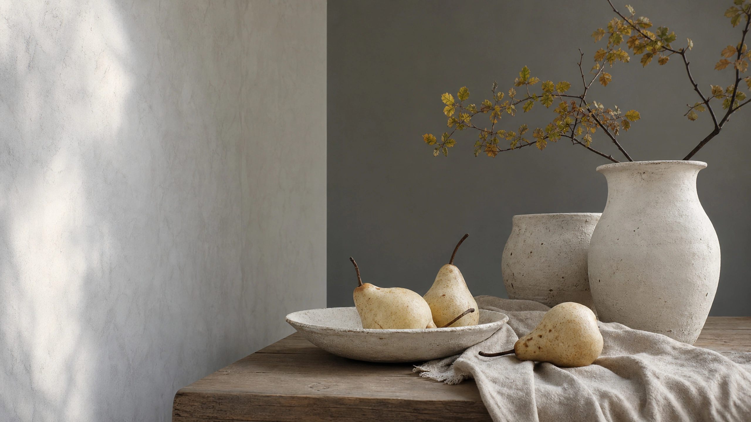 Pale pears with chalk-white handmade vessels under soft overcast studio-window light, original 4K still life objects wallpaper