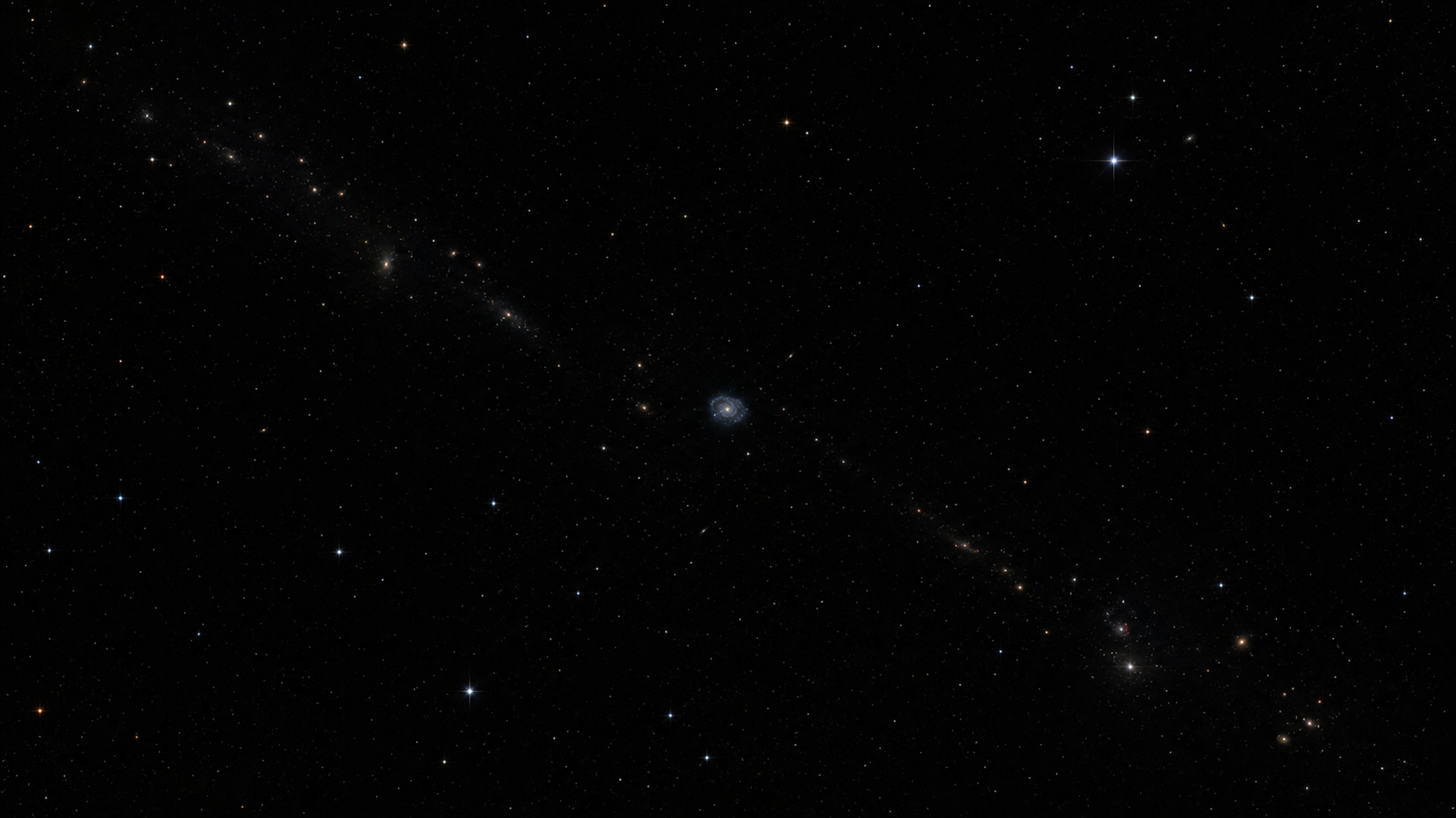 A subtle chain of faint distant galaxies forming a diagonal cosmic filament across a very dark star field, with one small blue spiral as the quiet focal point, original 4K space wallpaper
