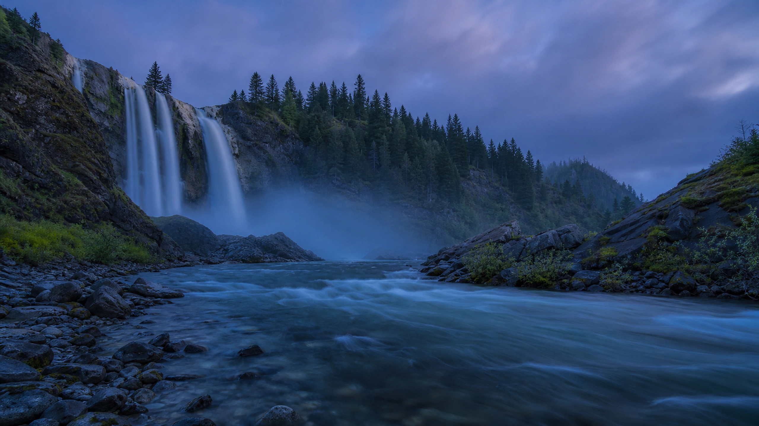 Waterfall and river in quiet blue hour with restrained long-exposure character, original 4K lakes rivers wallpaper