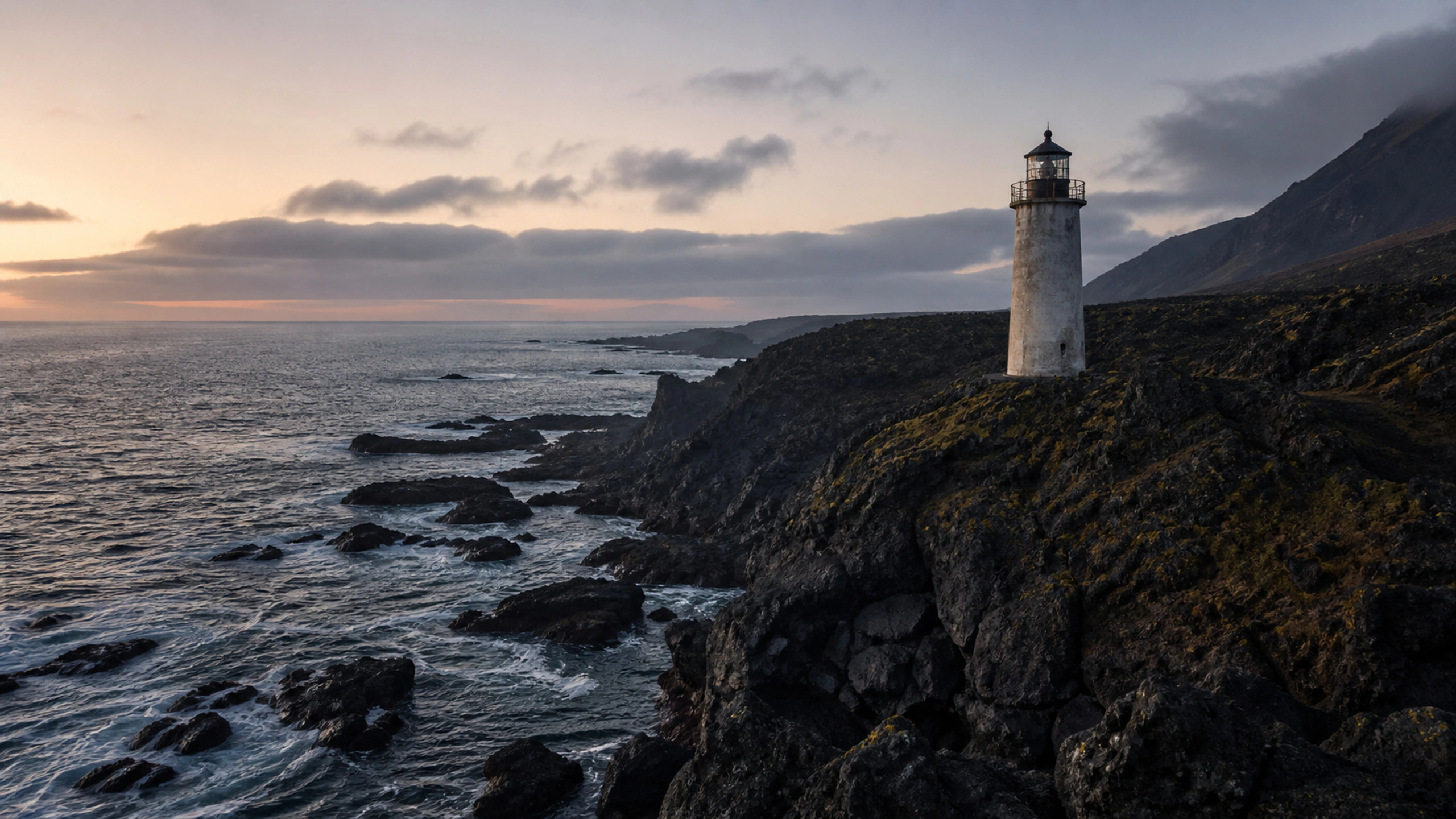 Minimal concrete lighthouse integrated into a black volcanic coastline, original 4K landmarks wallpaper