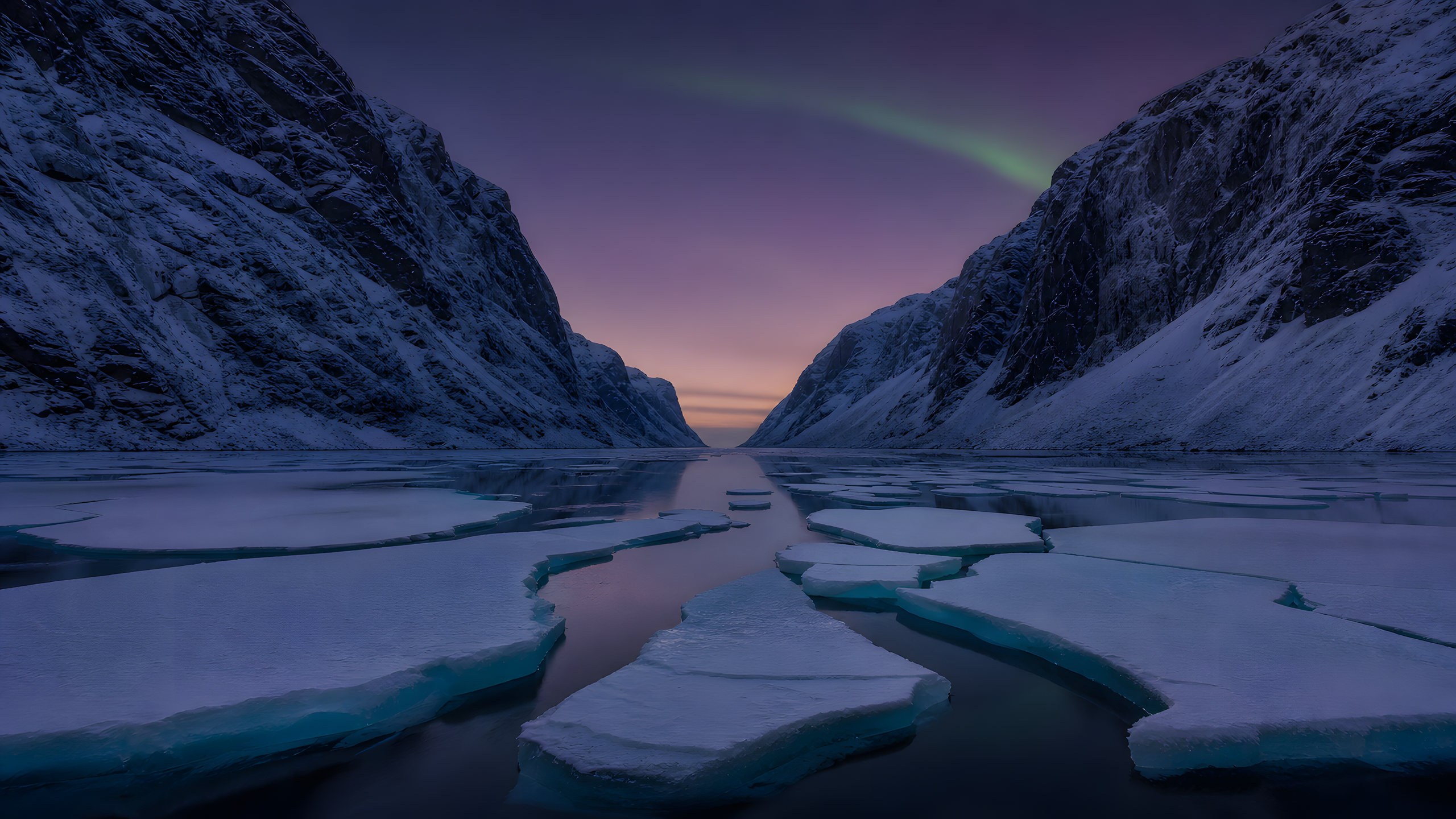 Dark metamorphic fjord walls traced by fresh snow above fractured turquoise sea ice, still black water and a faint restrained aurora in violet polar twilight, original 4K mountains wallpaper