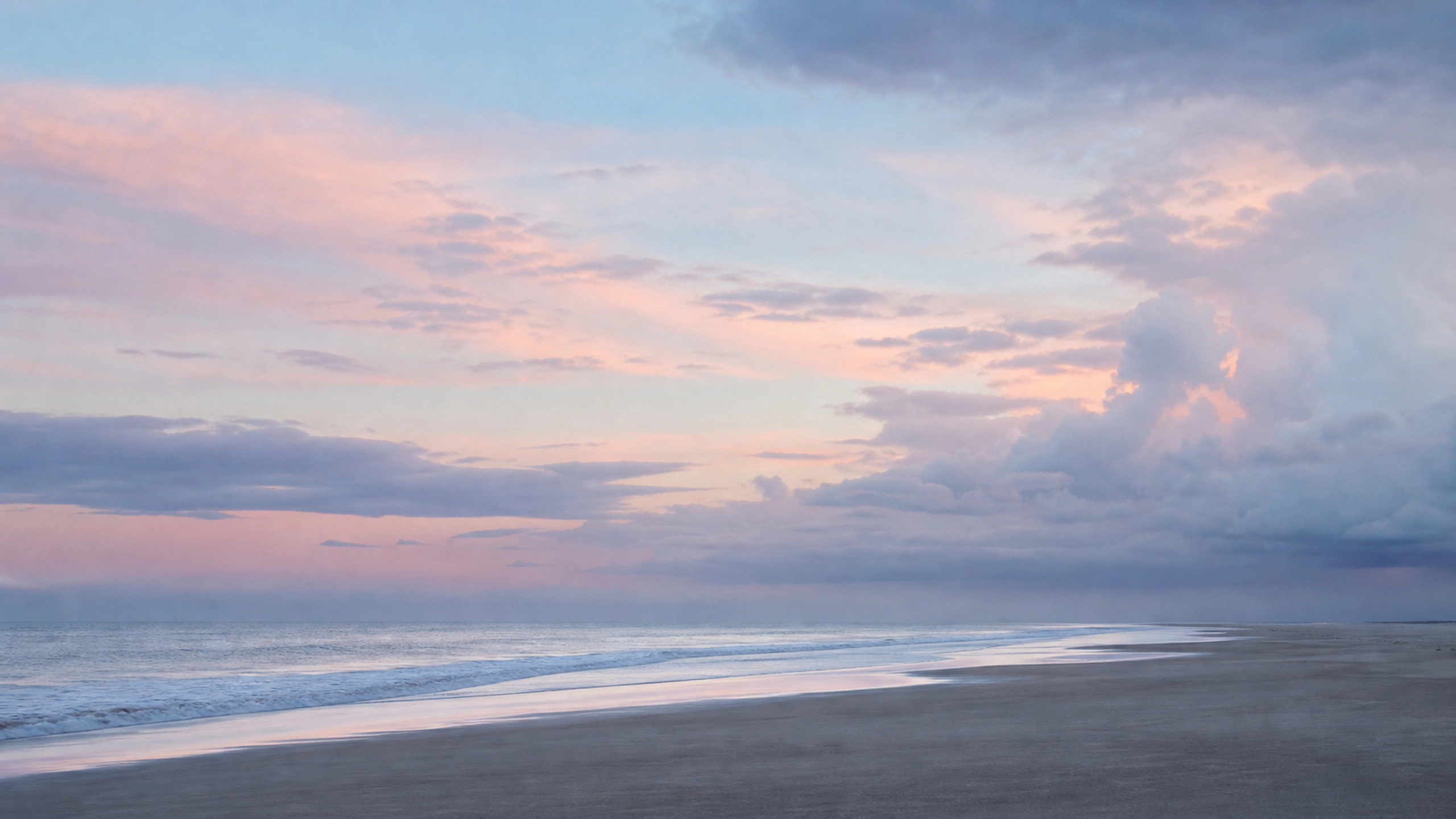 Minimal coast under a restrained pastel storm clearing with no structures, original 4K pastel wallpaper